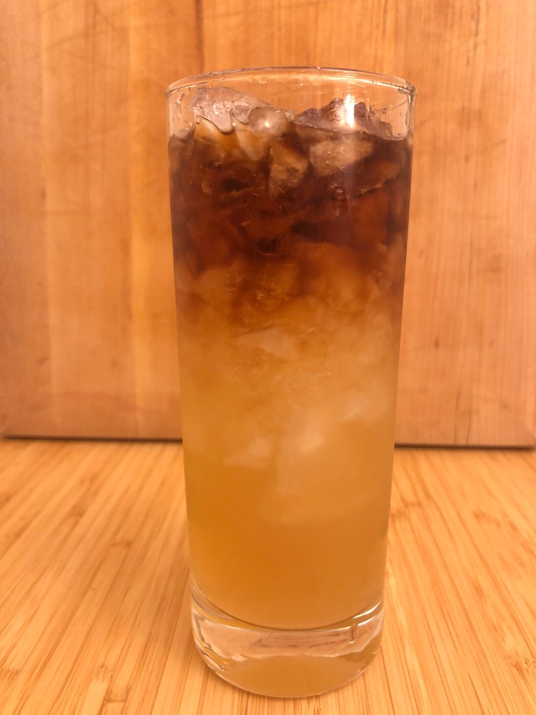 Corn 'n Oil cocktail in a Collins glass