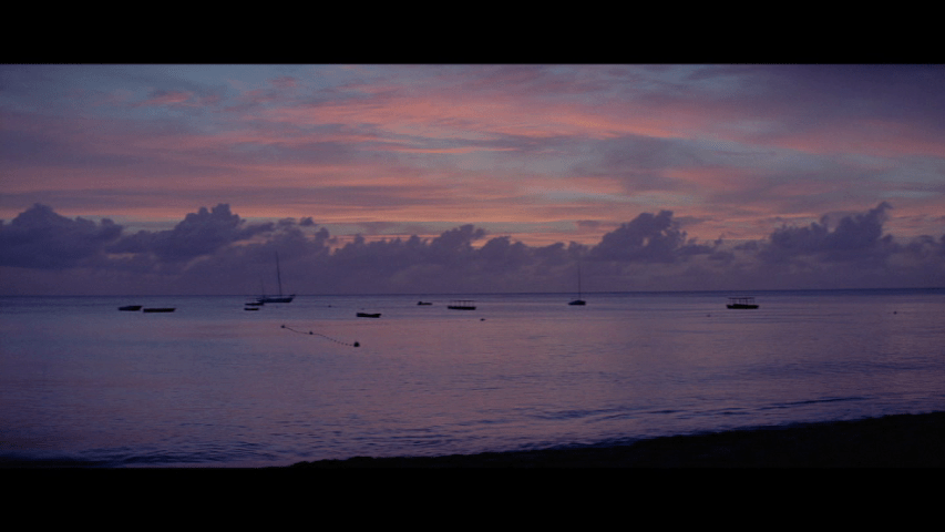 Screengrab from The Tamarind Seed showing a sunset