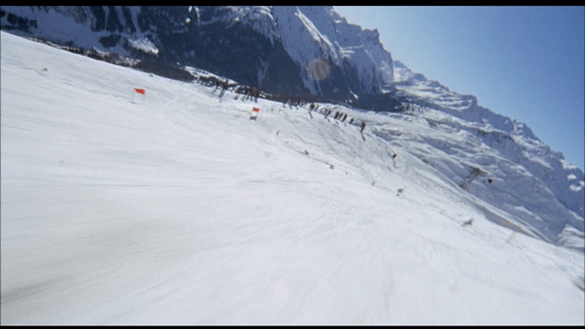Screengrab from Downhill Racer shot from the point of view of a skier.