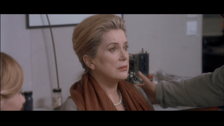 Screengrab from A Christmas Tale showing Junon looking shocked