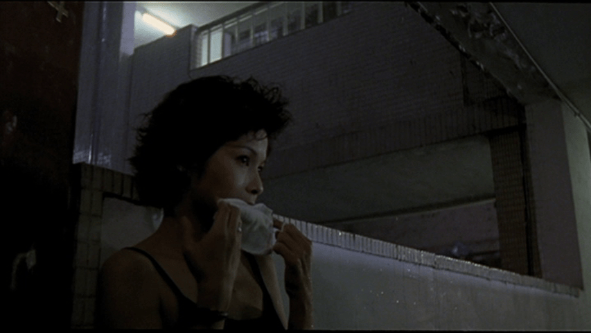 Screengrab from The Hole showing The Woman Downstairs erotically mouthing a mask