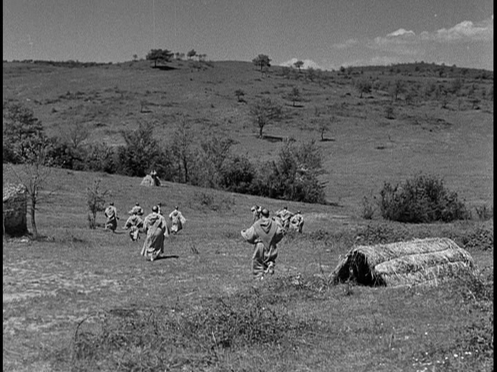 Screengrab from The Flowers of St. Francis showing monks running away from the camera