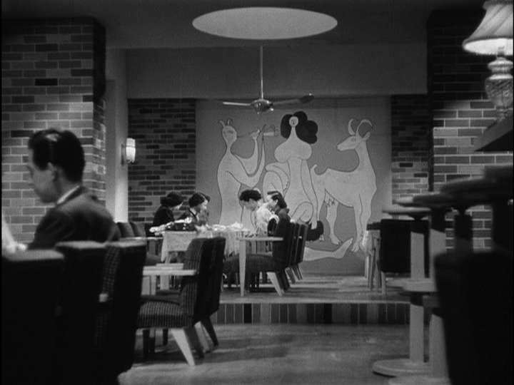 Screengrab from Early Summer showing Noriko sitting next to her single friend Aya and across a table from their married friends Taka and Mari