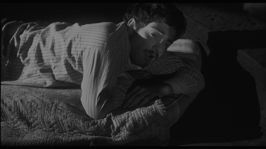 Screengrab from Hester Street showing a man reaction to something offscreen