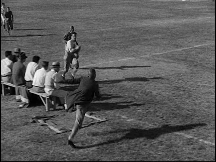 Screengrab from Horse Feathers showing Professor Wagstaff charging onto the football field to make a tackle