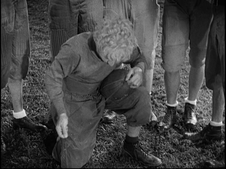 Screengrab from Horse Feathers showing Pinky tying a string to the ball