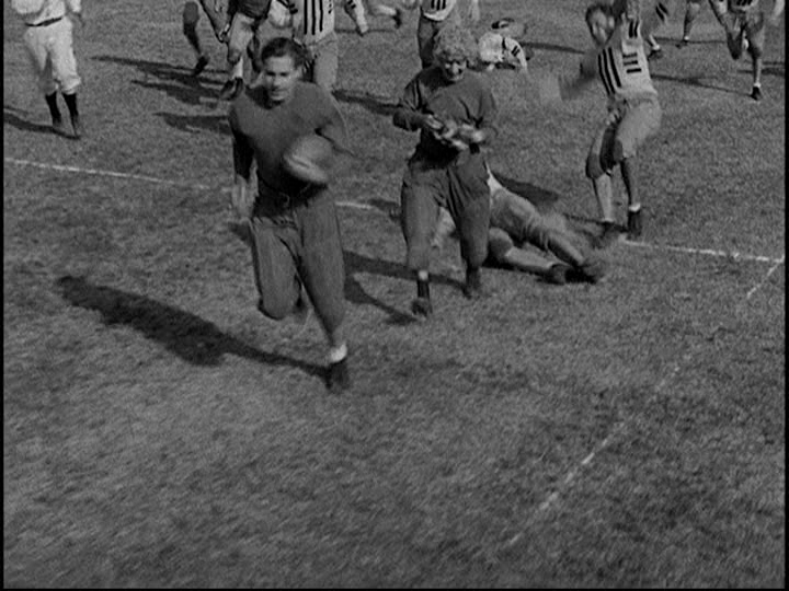 Screengrab from Horse Feathers showing Pinky tripping Darwin defenders with banana peels