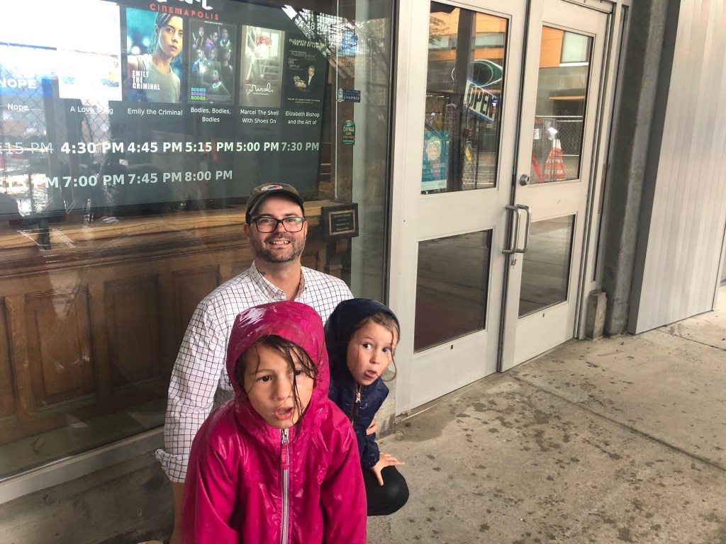 Me and my daughters and front of Cinemapolis