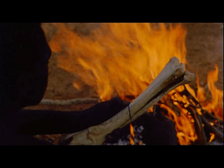 Screengrab from Yeelen showing Nianankoro conjuring magic with the right leg-bone of a horse.