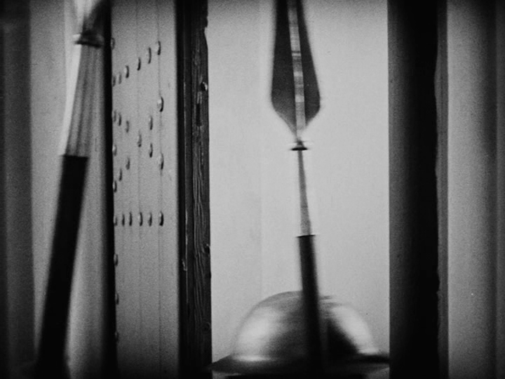 Another shot of a soldier's helmet and the tip of their spear