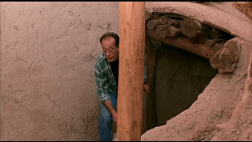Behzad at the entrance to a cellar