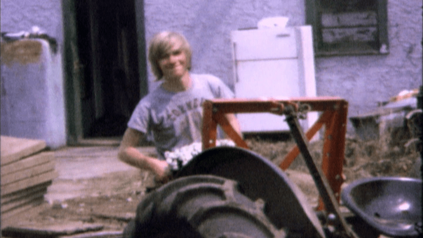 Photograph of a young Timothy Treadwell wearing a Cornell t-shirt