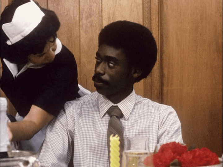 The Dubois's maid and Pierce give each other looks