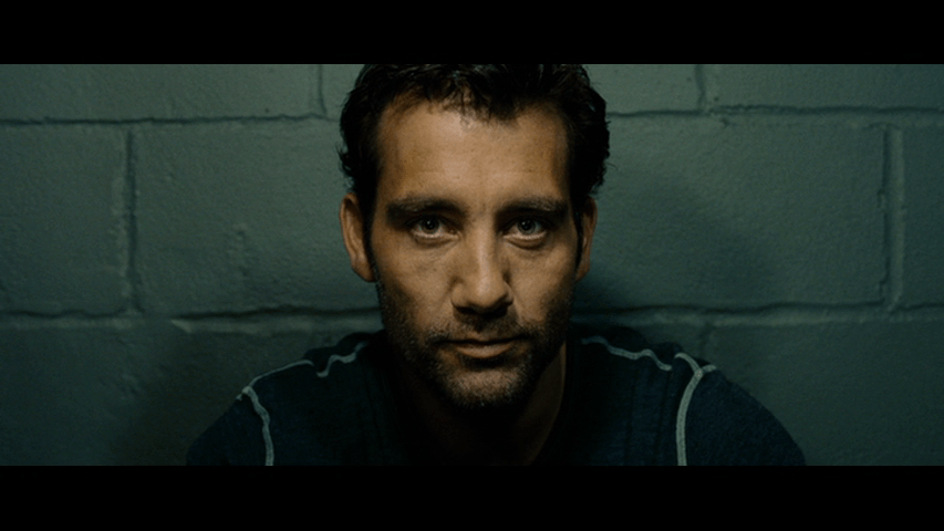 Dalton Russell addresses the camera at the beginning of Inside Man