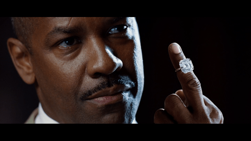 Detective Keith Frazier shows Arthur Case that he has the diamond ring which was in his safety deposit box