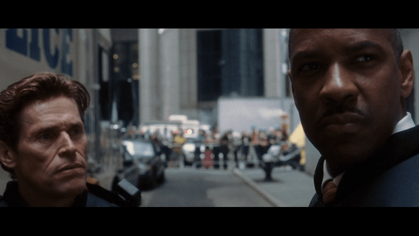 Medium shot of Detective Keith Frazier and Captain John Darius