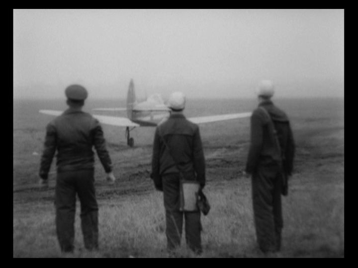 Pilots watching a plane take off
