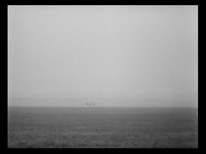 Plane taking off on a foggy day