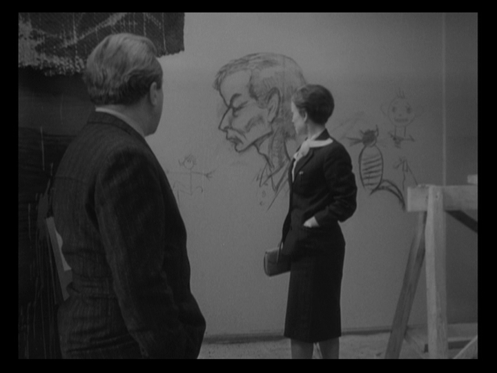Petrukhina contemplates an unflattering graffiti portrait of her