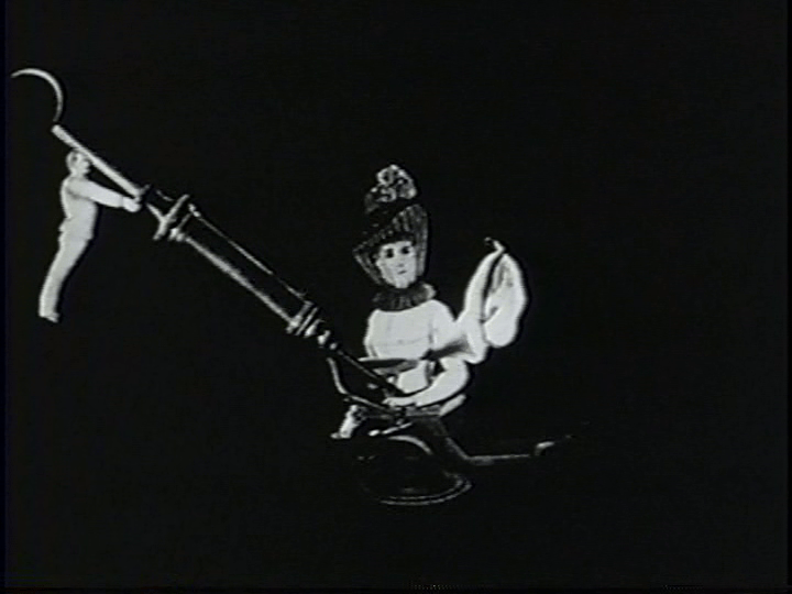 The magus injects the woman with a potion