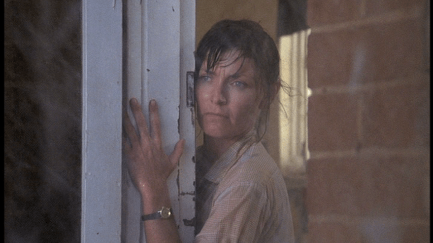 Close-up of the teacher looking out the door