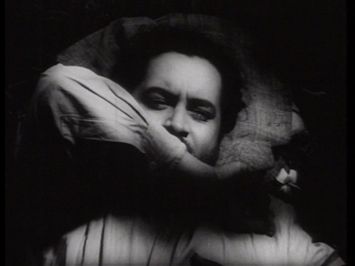 Close-up of Vijay waking up