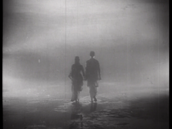 Extreme long shot of Vijay and Gulabo