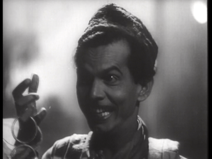Close-up of Johnny Walker as Abdul Sattar