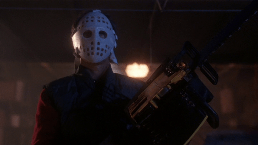 Clark with chainsaw and hockey mask