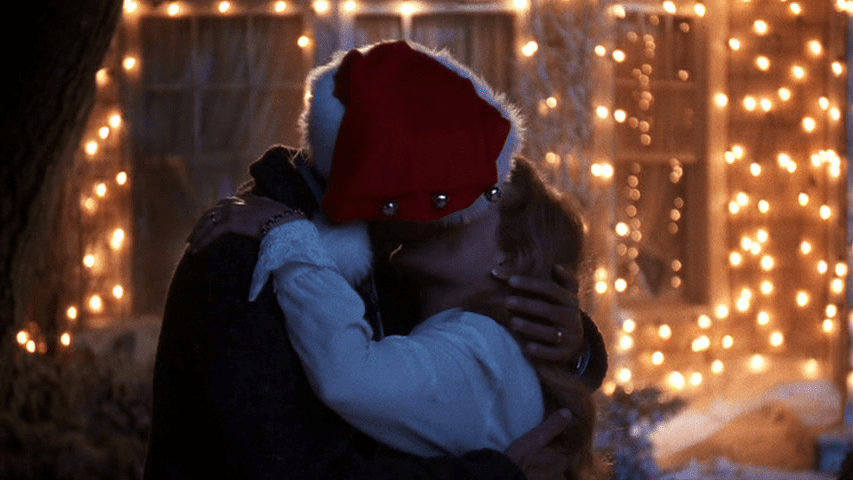 Clark and Ellen kissing outside