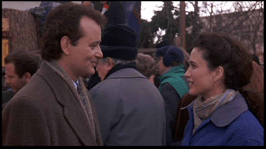 Medium shot of Phil talking to Rita