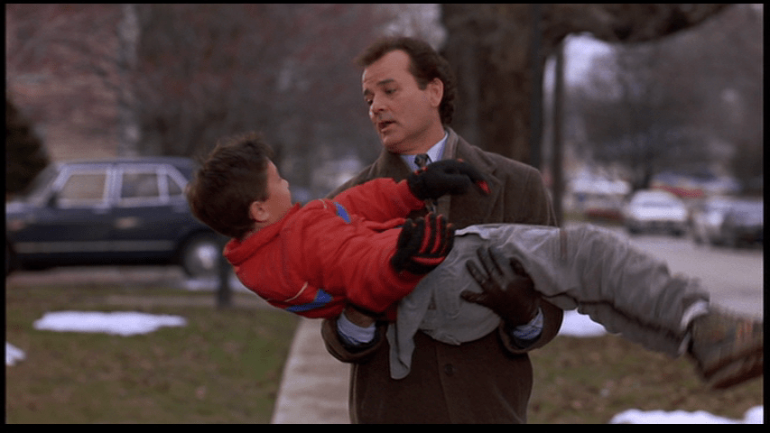 Phil and the child he has saved from injury, who fails to thank him