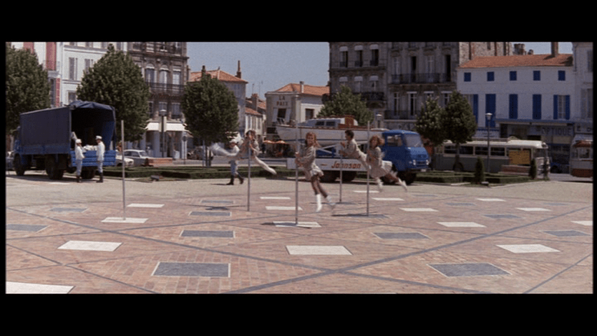 Pole dancing on the Place Colbert