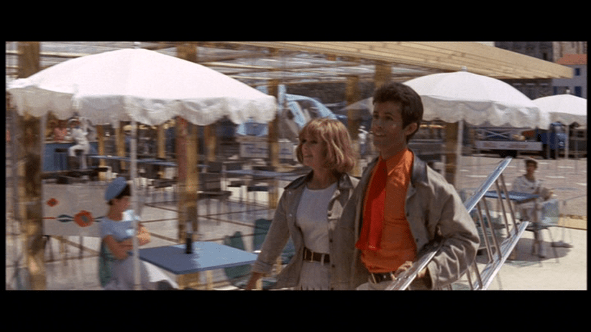 Etienne passes the café