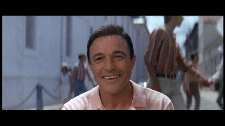 Gene Kelly smiling beatifically
