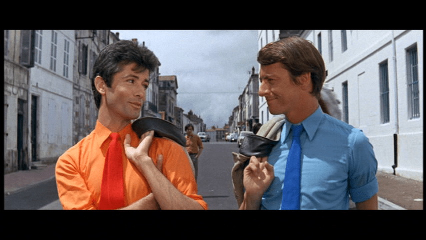 Medium shot of Bill and Etienne looking dapper