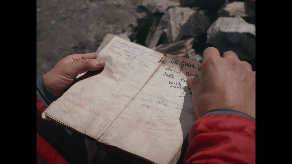 Pietro reads the notebook