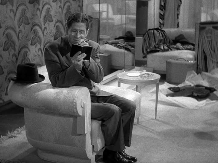 J.D. Hackensacker III and his notebook