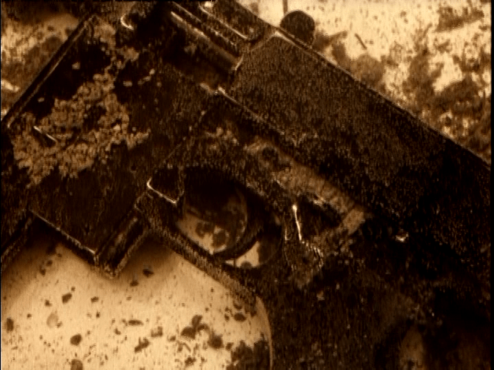 Close-up of a submered machine gun