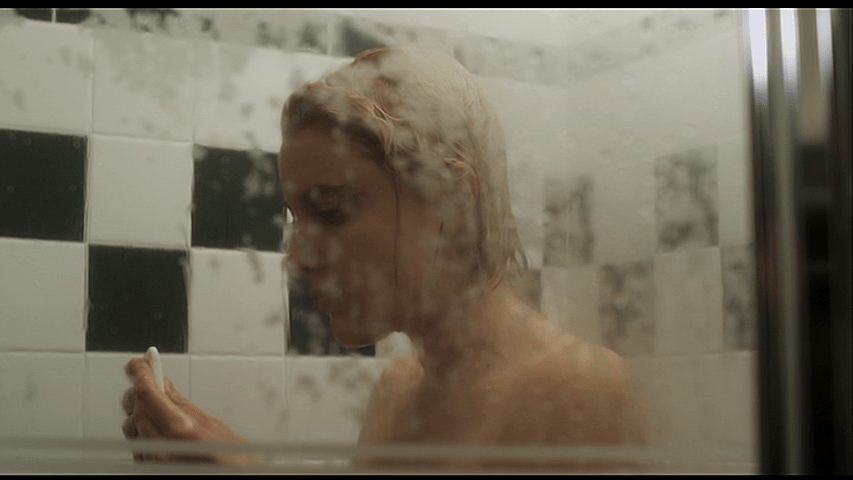 Violet discovers the "wonder bar" while taking a shower in the Motel 4 she has escaped to