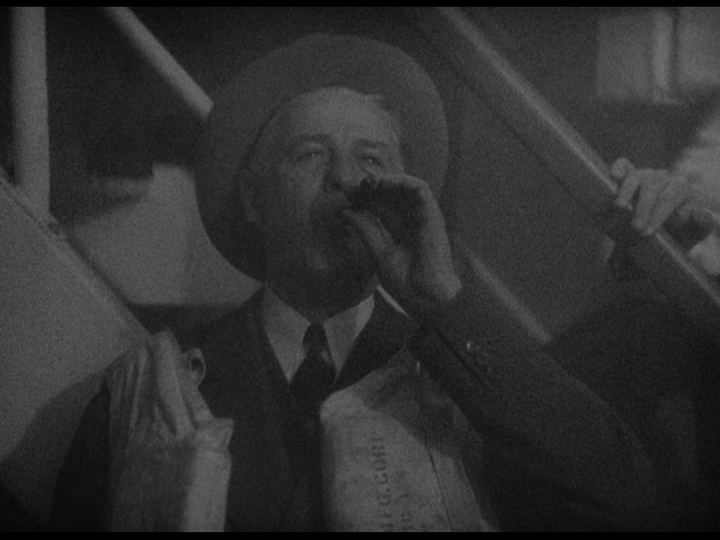 One man celebrates by smoking a cigar . . .