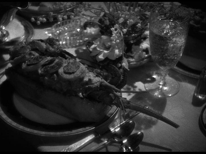 Close-up of Cesare's famous dish next to Paul and Irene's champagne of choice, Pink Cap '21