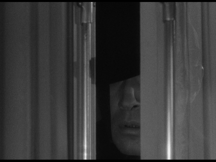 Paul pulls the brim of his hat over his eyes