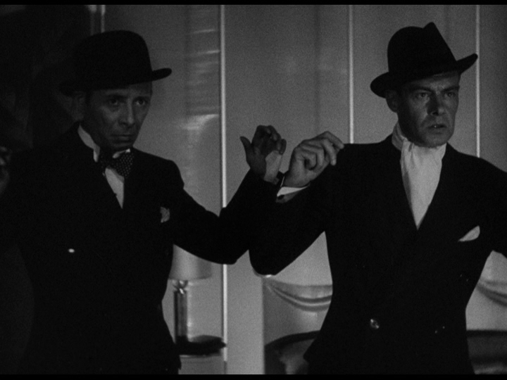 Norton and Vail with their hands up