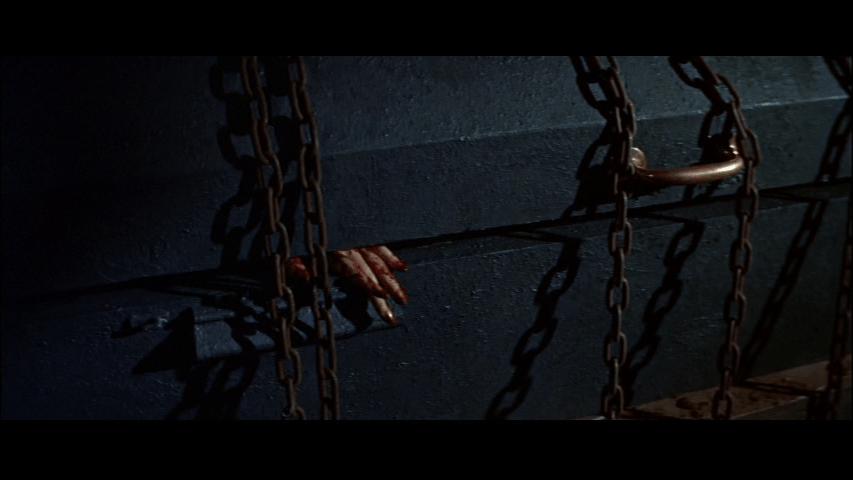 Close-up of Madeline's bloody fingers