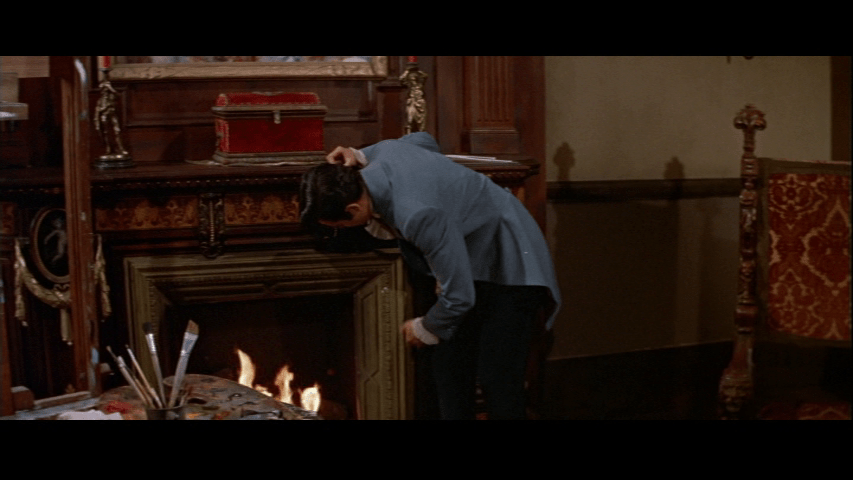 Medium shot of Philip brushing coals off his pants