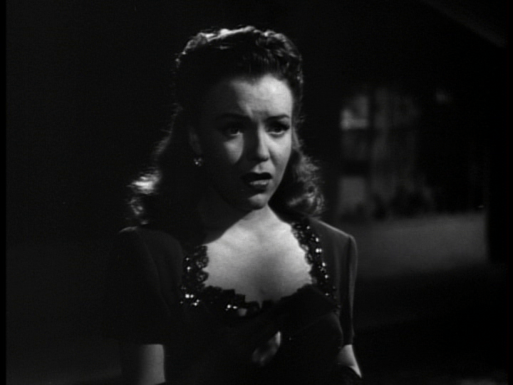 Close-up of Clo-Clo's ashen face