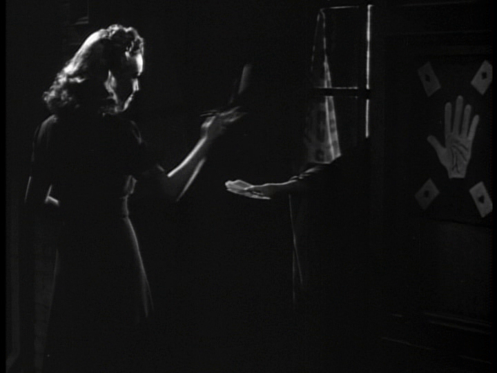 Clo-Clo tosses the card she drew away