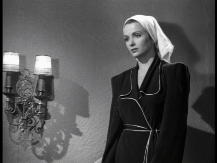 Medium shot of Kiki looking skeptical about the leopard