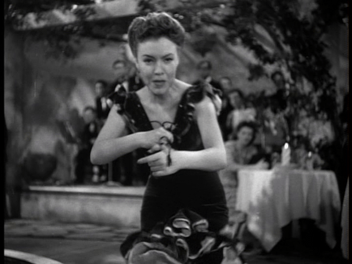 POV shot of Clo-Clo approaching with her castanets, part two